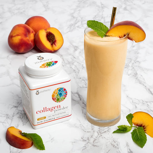 Collagen Powder Bottle Next to Peachy Keen Smoothie