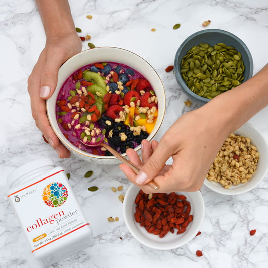 Collagen Powder Bottle next to Pitaya Bowl