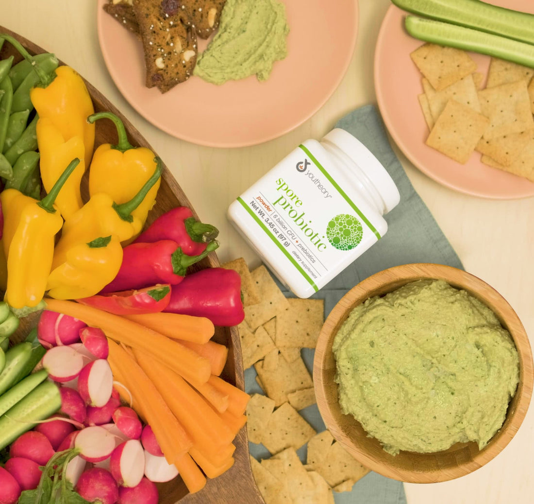 Spore Probiotic powder bottle next to Avocado and Sunflower Crema