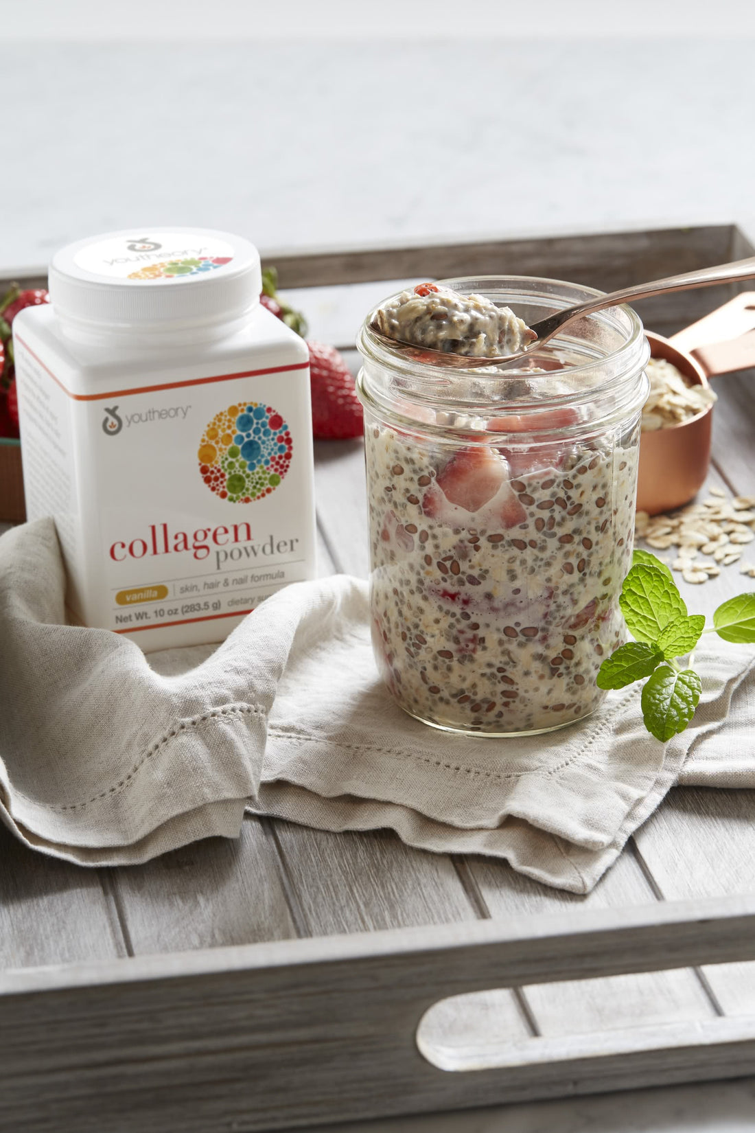 Collagen Powder Packets next to Overnight Oats jar